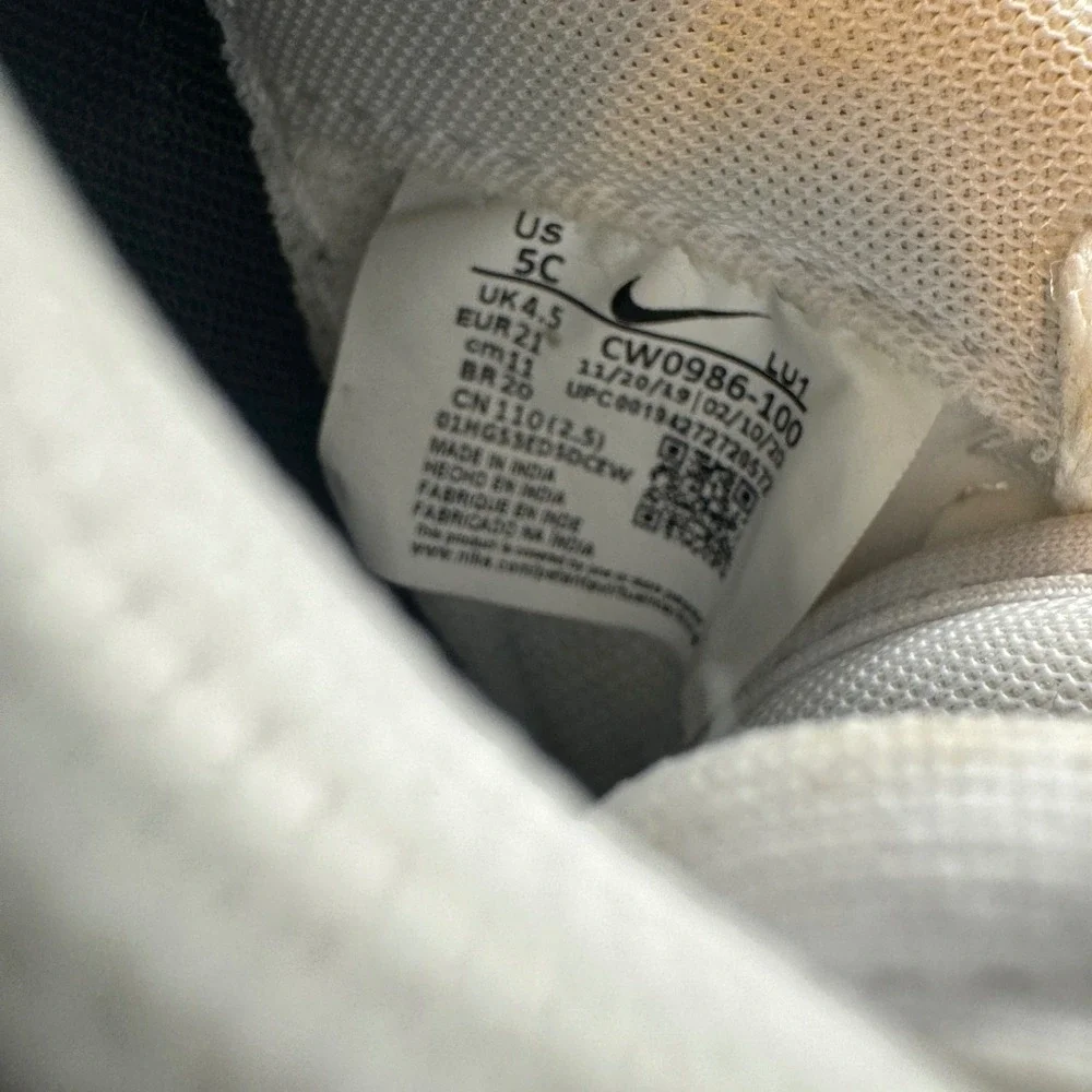 Nike Air Force One white unisex kids Athletics sneakers size 5C